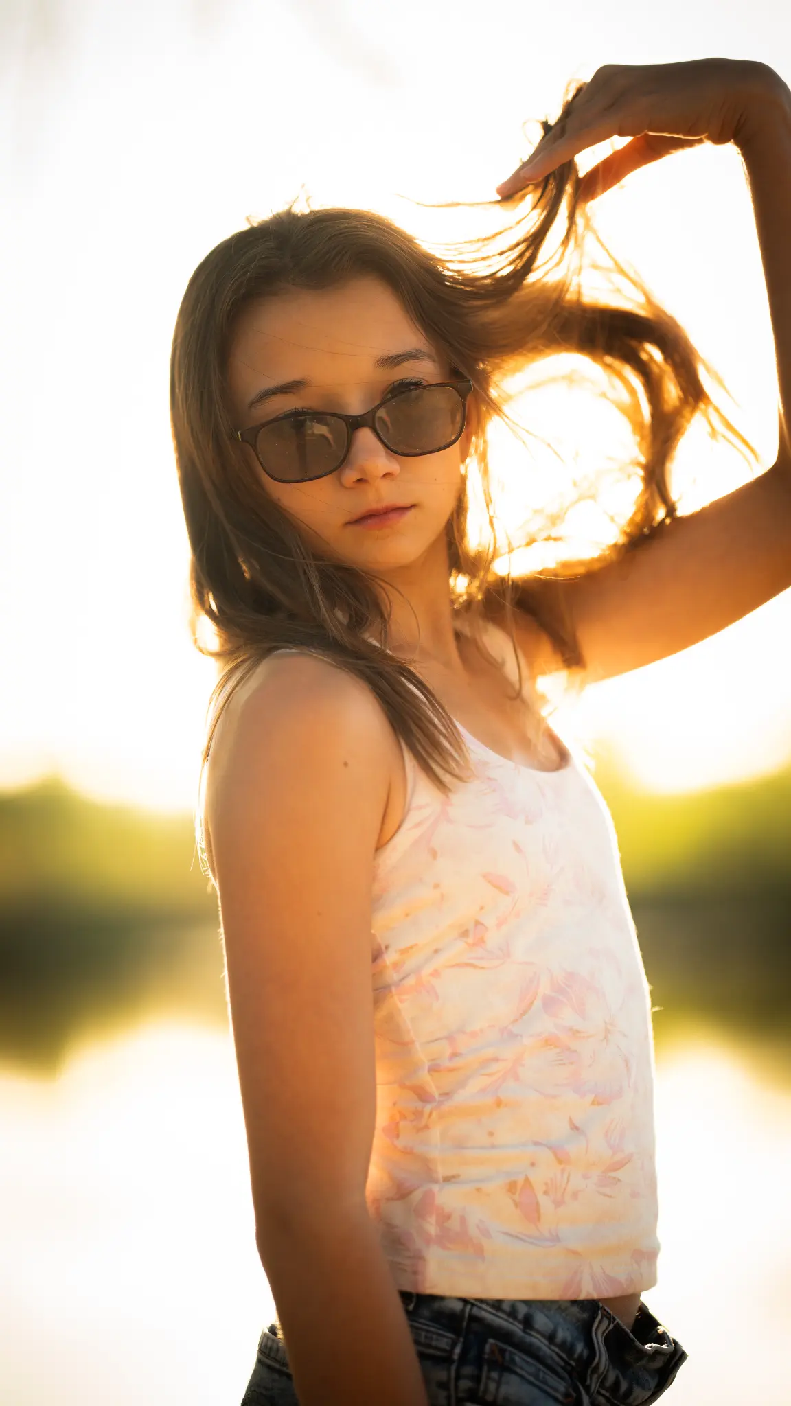 Lily Anna Zachman in a softly framed outdoor portrait.